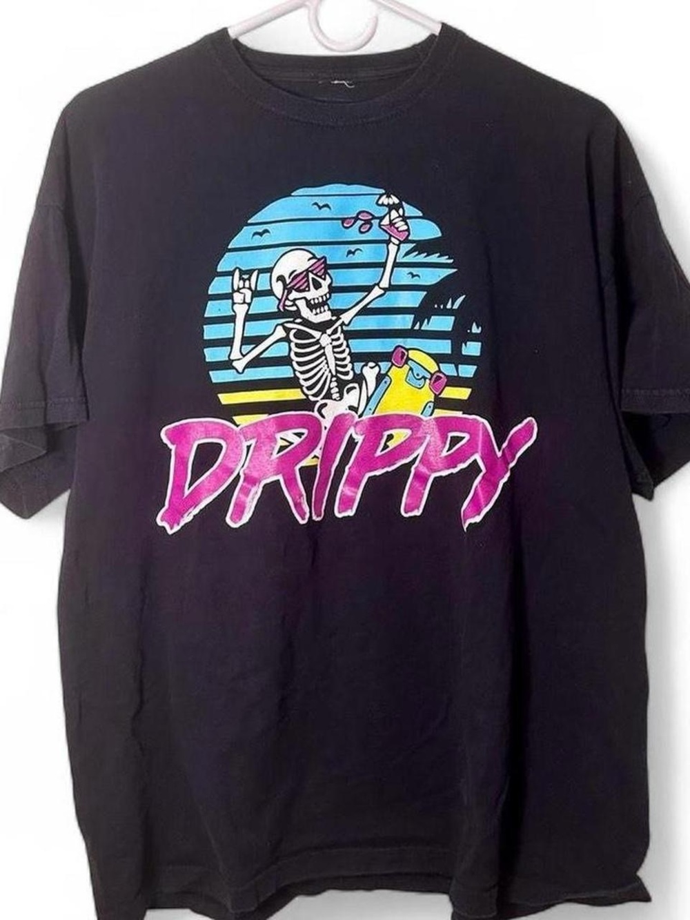 Skateboarding skeleton graphic tee